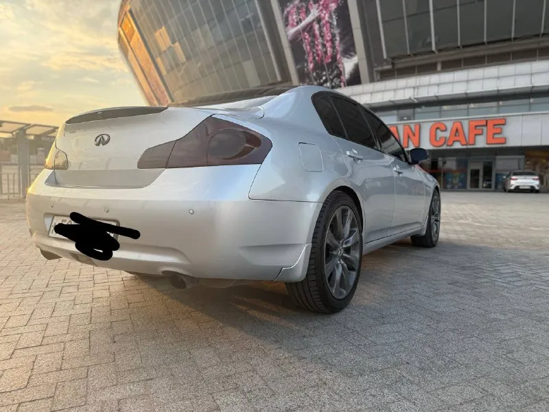Продам автомобиль: infiniti g35 sport двигатель: 3.5 коробка: автомат год: 2008 пробег: 245 000км во владении лично у меня 2 года, до этого находилось у друга, в машину вкладывали не жалели, за автомобилем ухаживали на одном сервисе! автомобиль прошел то нареканий по ходовой нет, ошибок нет! в автомобили стоят в фарах дорогие лазерные линзы, крыша не крашена, а поклеена дорогая пленка, тормозная система akebono, тормозные диски и колодки с nissan 370z стоят оригинальные диски r20 инфинити. сделан антихром по кузову, музыка bose вся система работает кроме fm радио. салон в хорошем состоянии, за кожей ухаживали как положено. автомобиль тонирован в 5% резина в состоянии на 85% зимний комплект имеется на сезон, а то и два точно хватит hankook. цена: 1 250 000р тел: +7949 315 56 80 📞 звоните: +7(949)3155680 - фотография - 4