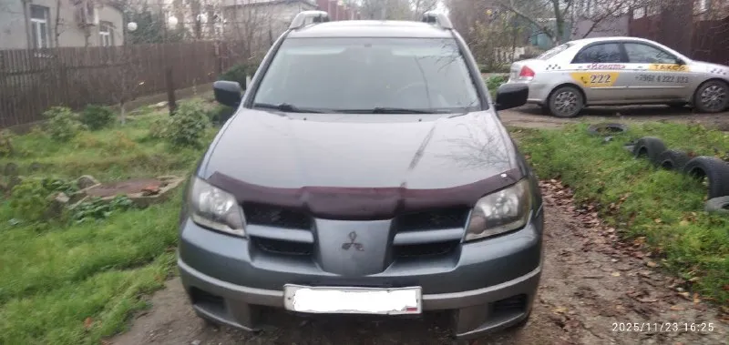 Продам mitsubishi outlander 2003год на полном ходу, но есть куда приложить руки. 2.4 газ/бензин, раб... - фотография