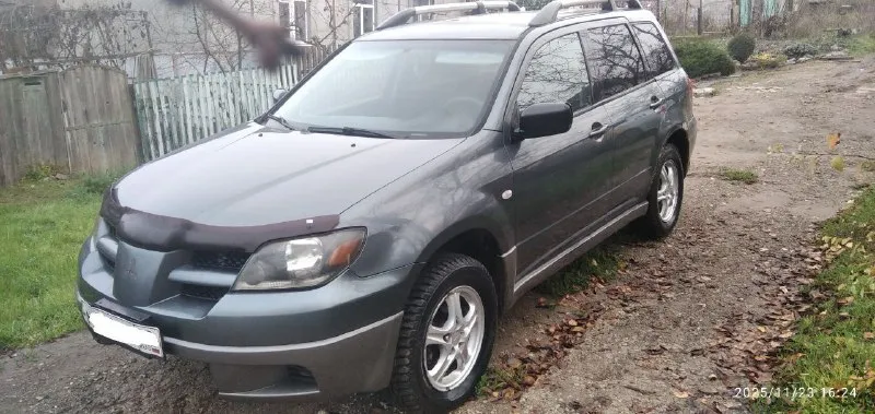 Продам mitsubishi outlander 2003год на полном ходу, но есть куда приложить руки. 2.4 газ/бензин, работает четко, без пинков. резина зима, 2 ключа, полное переоформление осмотр мариуполь левый берег. цена 450 тыс, +7 949 5740604 📲 tg: евгений 📞 звоните: +7(949)5740604 - фотография - 2