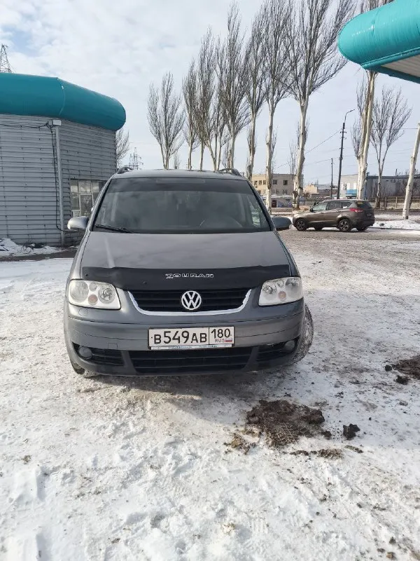Продам volkswagen turan 2006 года 2.0 газ/бензин механика заводское метан машина полностью обслужена... - фотография
