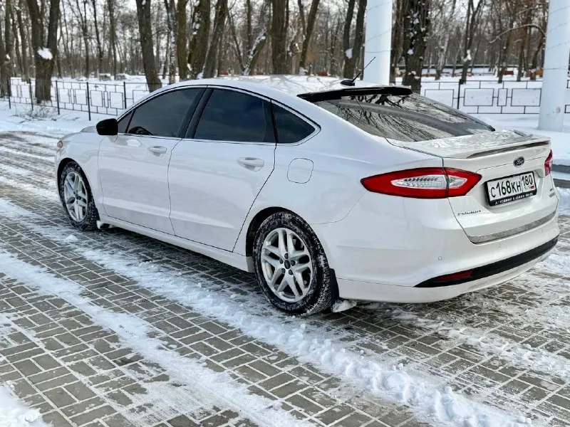 Цена 1649000 рублей (торг) продам fusion titanium north america (кузов c7) в топовом цвете white platinum птс 2014 производство, 2015 модельный год, растаможен на учете. двигатель 1.5 турбо (классический автомат) пробег 206 тыс км продаю лично я, я хозяин машины птс оригинал (эптс). долгов, штрафов, обременений не было и нет. порядочность гарантирую. классическая 6 ступенчатая акпп, отличная комплектация, салон натуральная кожа с памятью, люк и все что нужно для комфорта. из сша приехал полностью целым. технических и юридических проблем нет. автомобиль полностью в родной краске, все стекла и оптика завод, все в оригинале включая пылевую защиту днища. пробег пишу реальный а не как в 90% объявлений. на каждой детали уф маркер и наклейка ничего не менялось и не билось. полностью исправен : все агрегаты, узлы и электроника работают штатно. никаких ошибок, запотеваний, течей и прочего нет. обслуживался мной без экономии от а до я. произведена модификация системы впуска оригин 📞 звоните: +7(949)0040701 - фотография - 3
