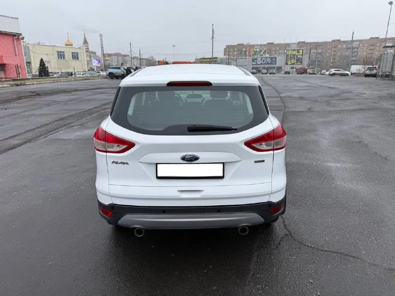 Ford kuga 2013, бензиновый двигатель 1.6, механическая коробка передач. два собственника. подтвержденный оригинальный пробег — 168 000 км. отличное состояние! кузов оцинкован, все стекла оригинальные, включая лобовое. двигатель работает ровно, без посторонних шумов и ошибок. коробка передач плавная, ходовая часть без стуков. полный комплект ключей и сервисная книга. документы в полном порядке, продажа с полным оформлением. обмен не рассматривается. фиксированная цена — 850 000 рублей. город донецк. телефон: +7(949)3710826. готовы предоставить все данные по автомобилю и видеообзор. 📞 звоните: +7(949)3710826 - фотография - 4