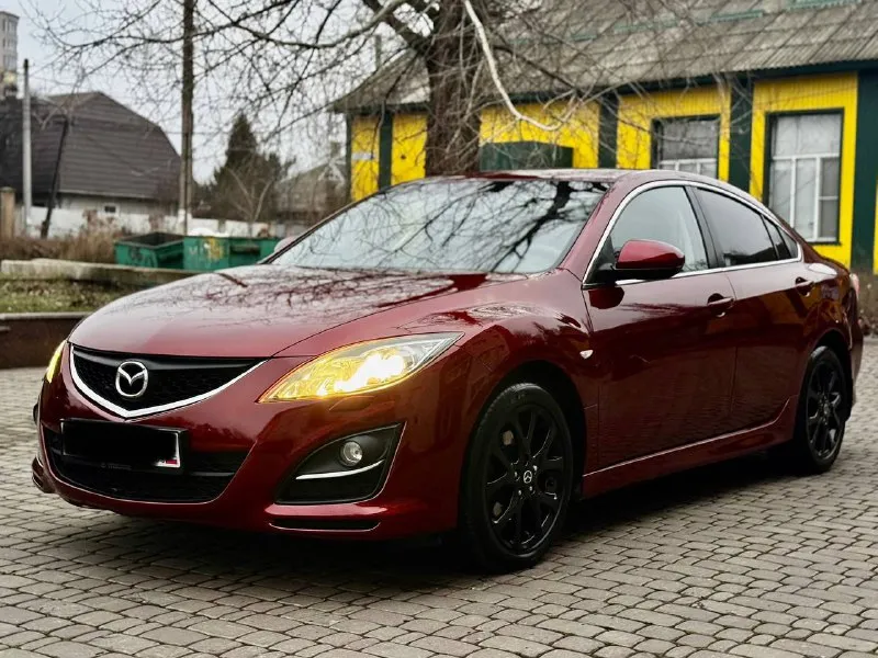 Продам свой автомобиль mazda mazda 6 2011г 2.0 коробка автомат машина в отличном состоянии, кузов весь в родном окрасе. по ходовой части полный порядок, из последнего было сделано: перебрана рулевая рейка хорошим комплектующим, сделана замена масла в коробке и фильтра 40т. по комплектации: двух зонный климат контроль (работает отлично) подогрев передних сидений комбинированный салон кожа датчик дождя и света круиз контроль электрорегулировка и электроскладывание боковых зеркал два комплекта ключей пробег 175 000 км. без дтп кто ищет для себя ухоженный автомобиль звоните цена 1 100 000 руб. осмотр в донецке. рассматриваю обмен с вашей доплатой. + +7949 508 96 15 вячеслав 📞 звоните: +7(949)5089615 - фотография - 2