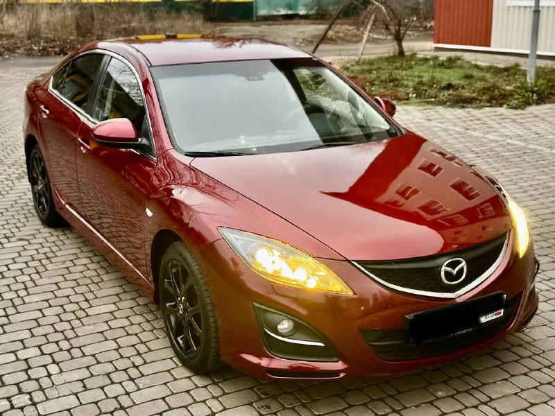 Продам свой автомобиль mazda mazda 6 2011г 2.0 коробка автомат машина в отличном состоянии, кузов весь в родном окрасе. по ходовой части полный порядок, из последнего было сделано: перебрана рулевая рейка хорошим комплектующим, сделана замена масла в коробке и фильтра 40т. по комплектации: двух зонный климат контроль (работает отлично) подогрев передних сидений комбинированный салон кожа датчик дождя и света круиз контроль электрорегулировка и электроскладывание боковых зеркал два комплекта ключей пробег 175 000 км. без дтп кто ищет для себя ухоженный автомобиль звоните цена 1 100 000 руб. осмотр в донецке. рассматриваю обмен с вашей доплатой. + +7949 508 96 15 вячеслав 📞 звоните: +7(949)5089615 - фотография - 4