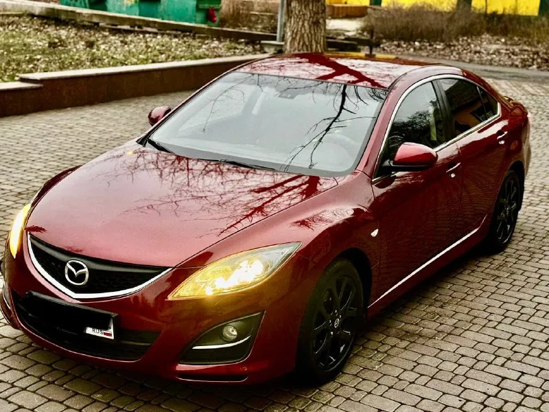 Продам свой автомобиль mazda mazda 6 2011г 2.0 коробка автомат машина в отличном состоянии, кузов весь в родном окрасе. по ходовой части полный порядок, из последнего было сделано: перебрана рулевая рейка хорошим комплектующим, сделана замена масла в коробке и фильтра 40т. по комплектации: двух зонный климат контроль (работает отлично) подогрев передних сидений комбинированный салон кожа датчик дождя и света круиз контроль электрорегулировка и электроскладывание боковых зеркал два комплекта ключей пробег 175 000 км. без дтп кто ищет для себя ухоженный автомобиль звоните цена 1 100 000 руб. осмотр в донецке. рассматриваю обмен с вашей доплатой. + +7949 508 96 15 вячеслав 📞 звоните: +7(949)5089615 - фотография - 5