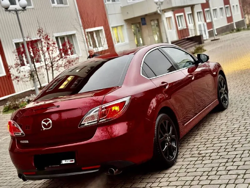 Продам свой автомобиль mazda mazda 6 2011г 2.0 коробка автомат машина в отличном состоянии, кузов весь в родном окрасе. по ходовой части полный порядок, из последнего было сделано: перебрана рулевая рейка хорошим комплектующим, сделана замена масла в коробке и фильтра 40т. по комплектации: двух зонный климат контроль (работает отлично) подогрев передних сидений комбинированный салон кожа датчик дождя и света круиз контроль электрорегулировка и электроскладывание боковых зеркал два комплекта ключей пробег 175 000 км. без дтп кто ищет для себя ухоженный автомобиль звоните цена 1 100 000 руб. осмотр в донецке. рассматриваю обмен с вашей доплатой. + +7949 508 96 15 вячеслав 📞 звоните: +7(949)5089615 - фотография - 8