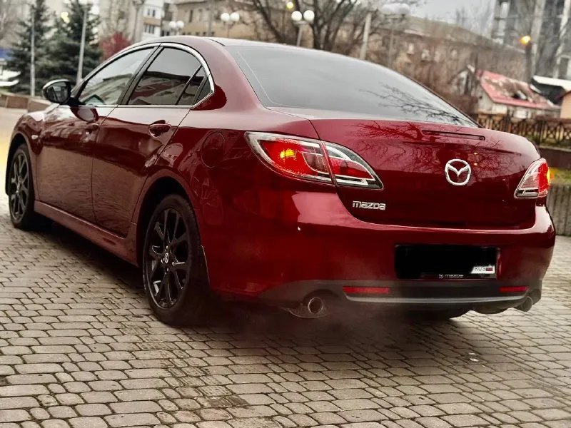 Продам свой автомобиль mazda mazda 6 2011г 2.0 коробка автомат машина в отличном состоянии, кузов весь в родном окрасе. по ходовой части полный порядок, из последнего было сделано: перебрана рулевая рейка хорошим комплектующим, сделана замена масла в коробке и фильтра 40т. по комплектации: двух зонный климат контроль (работает отлично) подогрев передних сидений комбинированный салон кожа датчик дождя и света круиз контроль электрорегулировка и электроскладывание боковых зеркал два комплекта ключей пробег 175 000 км. без дтп кто ищет для себя ухоженный автомобиль звоните цена 1 100 000 руб. осмотр в донецке. рассматриваю обмен с вашей доплатой. + +7949 508 96 15 вячеслав 📞 звоните: +7(949)5089615 - фотография - 9