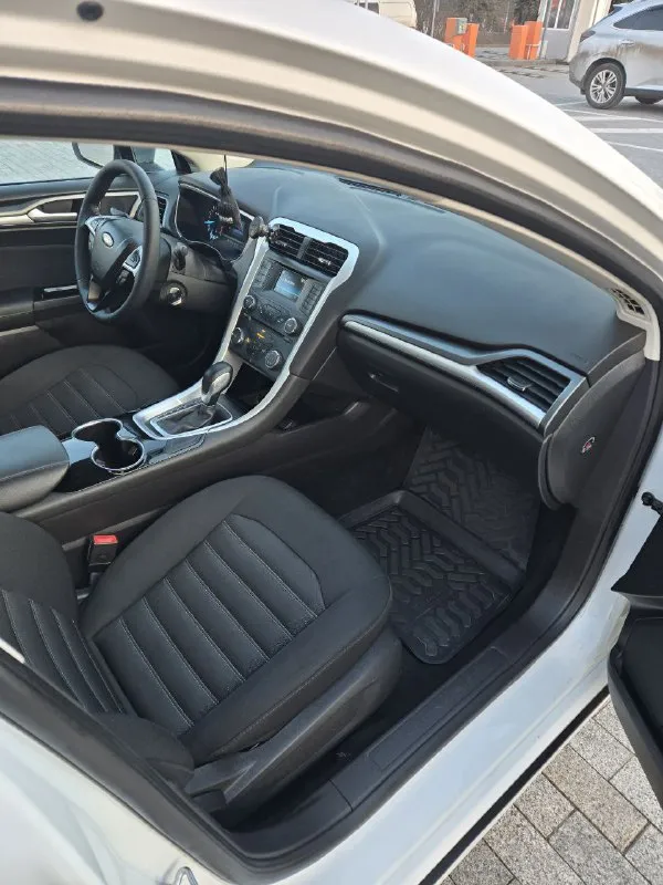 Срочно !!!в продаже форд мондео. диагностическая карта есть. можно сразу переоформить в мрэо. 2015 год, объем 2.5. пробег 117 000 родной. коробка обычный автомат. за всё время два собственника. машина в отличном состоянии, без вложений. кузов в родном окрасе. комплектация: - круиз - климат - обогрев заднего и лобового стекла - обогрев сидений - датчик давления шин - электро ручник - 4 электросклоподъемника в машине работает каждая кнопка. готов на любые проверки на вашем сто. более подробная информация по телефону. цена 1 250 000 торг тел +79495058416 - фотография - 6