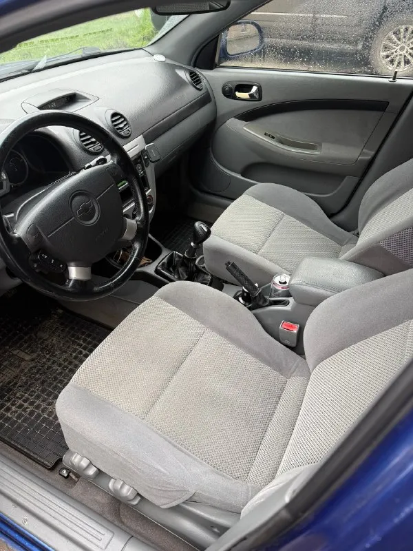 Продам лачетти 2008г. мотор 1.6, пробег 254.000 автомобиль в отличном состоянии! из недавнего менялось : сцепление, передние диски, колодки, прокладка, масло ( мотор и коробка ), трос ручника, жидкость усилителя, антифриз, помпа, ремни, ролики, свечи ngk ! сухой, работает тихо, коробка отлично! салон без дефектов, не затертый! работает абсолютно все! 2 комплекта хорошей резины ! сигнализация с автозапуском ! автотека зеленая ! без дтп и расчетов ! осмотр луганск, цена 610.000₽ торг +79591917365 ( телеграмм ) 📞 звоните: +7(959)1917365 - фотография - 5