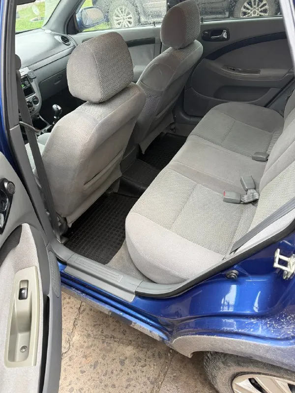 Продам лачетти 2008г. мотор 1.6, пробег 254.000 автомобиль в отличном состоянии! из недавнего менялось : сцепление, передние диски, колодки, прокладка, масло ( мотор и коробка ), трос ручника, жидкость усилителя, антифриз, помпа, ремни, ролики, свечи ngk ! сухой, работает тихо, коробка отлично! салон без дефектов, не затертый! работает абсолютно все! 2 комплекта хорошей резины ! сигнализация с автозапуском ! автотека зеленая ! без дтп и расчетов ! осмотр луганск, цена 610.000₽ торг +79591917365 ( телеграмм ) 📞 звоните: +7(959)1917365 - фотография - 6