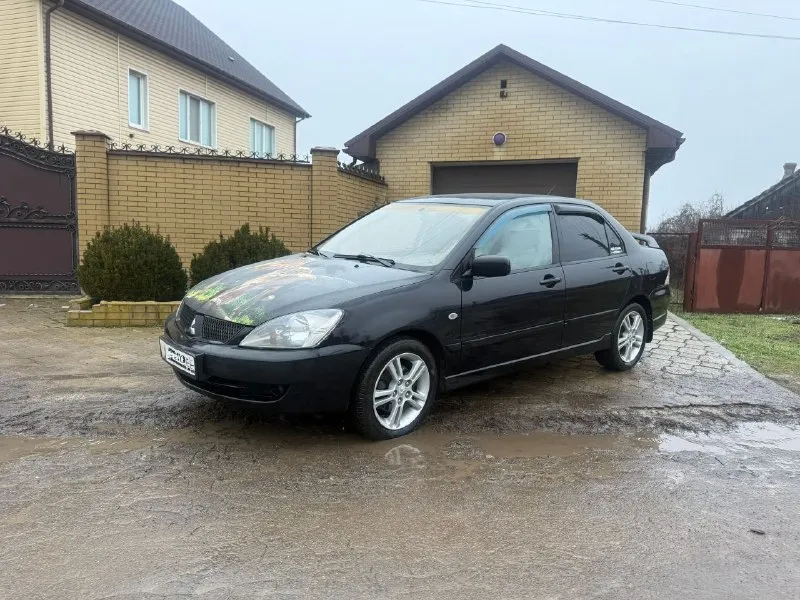 Продам mitsubishi ланцер 2006 года 2.0 на автомате ( не путайте с 1.6 это совсем другой автомобиль!). машинка в хорошем состоянии много сил и любви в нее вложено! комплектация: подогрев сидений, хорошая музыка андроид и хорошие динамики ( все выведено под усилитель в багажник), 4 стеклоподъёмника, климат контроль, сигнализации в родном ключе, гидроусилитель руля, полная обесшумка салона! оригинальный обвес с спойлером, руль момо, колеса на 5 болтов и 16 радиус ( это все с завода и этим отличается от 1.6), спортивный щиток! полная обесшумка салона, выкраска пластика и много мелких доработок делая машину особенной! 580 т. р, торг уместен у капота! одним словом хороший динамичный автомобиль за свои деньги, дарит эмоции от езды! +79490725104 📞 звоните: +7(949)0725104 - фотография - 2