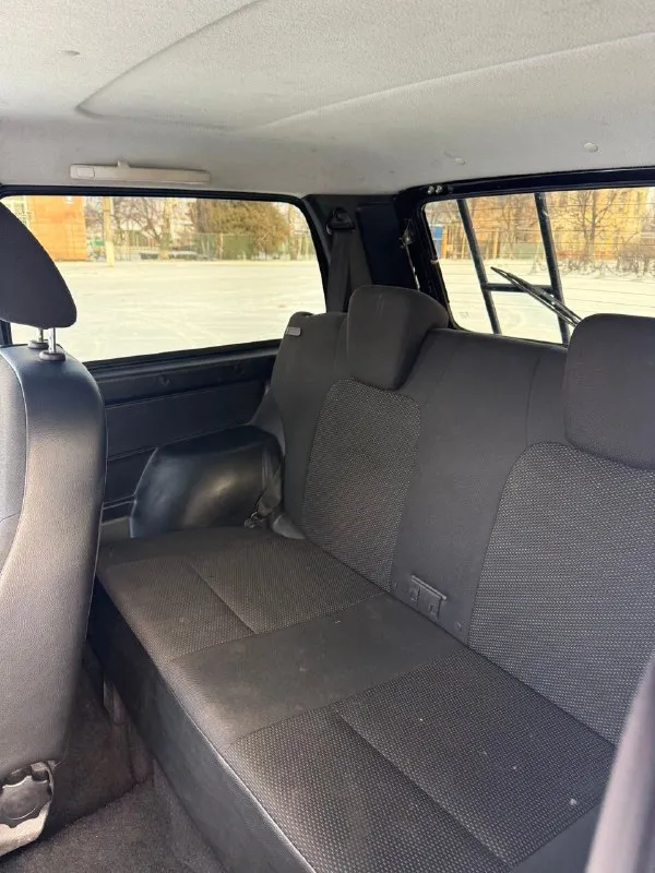 Свежий внедорожник ваз 4x4 (нива) 2020 г. в. с историей. · отличное состояние: 2020 год ( рейстайлинг ) • пробег 58 000 км · полная прозрачность:оригинальный птс, два владельца. автомобиль не бит, не крашен · двигатель 1.7 / ( 83 л. с. ) / бензин · наличие кондиционера (комплектация luxe), полный привод, 3 двери цена : 820 000 место осмотра : г. петровское ( краснолучский район ) номер телефона : +7 959 503-08-90 📞 звоните: +7(959)5030890 - фотография - 10