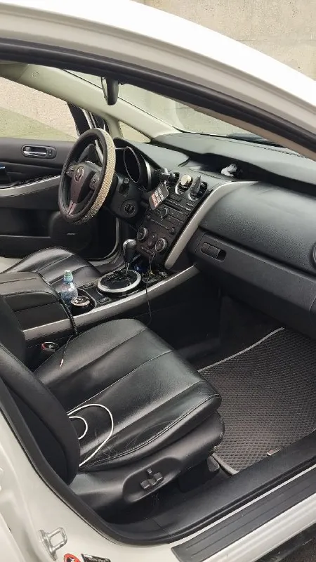 Продам mazda cx-7 2011 года машина в хорошем состоянии. 🚀 объем двигателя 2.3-turbo(бензин) коробка 6-ти ступенчатый автомат. полный привод. турбина работает хорошо коробка не пинает работает отлично 📝машина в хорошей комплектации ✅подогрев передних сидений ✅климат контроль ✅кожаный салон ✅салон в хорошем состоянии ✅стоит достойная музыка boss saund🔥 я хозяин осмотр донецк 💸 - цена 850т торг присутствует остальные вопросы по телефону 📲- +79496393225 📲 tg: @vesnachebeka 📞 звоните: +7(949)6393225 - фотография - 2