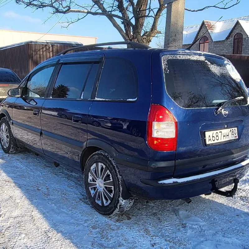 Opel зафира opel zafira 1.6 16v рестайлинг 2004 г. в. хорошее состояние авто. пригнана в 2018 году в донецк, один собственник. родной пробег, вся история обслуживания. установлено пропан, фаркоп все узаконено. двусторонняя сигнализация sheriff, магнитола планшет с carplay. не бит, корозии нет. стекла атермальные родные. хорошая комплектация: 10 airbag, кондиционер, круиз контроль, птф, полный бортовой компьютер итд. все работает. 2 ключа. донецк. плохая связь. 550т. р. +79498049797 📞 звоните: +7(949)8049797 - фотография - 7