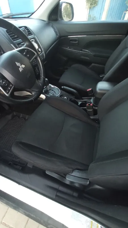 Mitsubishi outlander sport (asx) г. луганск 2.0l 4wd ‼️2014 год. подключаемый полный привод двигатель 2.0, 150л. с кондиционер, птф, гур сигнализация с автозапуском подогрев зеркал курсовая устойчивость, круиз-контроль, abs, мультируль, камера заднего вида, управление на руле. салон в идеальном состоянии. коврики delform(оригинальные также в наличии) технически исправный двигатель и коробка полностью обслужены(установлены оригинальные запчасти), пробег 165тыс. миль зимня резина в комплекте масло менялось каждые 7 тыс. км. ‼️ один хозяин по птс‼️ безопасность в целости. всё работает. +79591083015 📞 звоните: +7(959)1083015 - фотография - 6