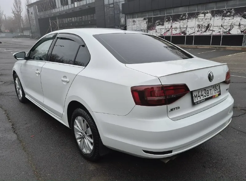 Volkswagen jetta 2016 мотор 1.4т (150л. с) акпп- 6ст aisin пробег 97т. км хорошая комплектация- датчик света, подогревы, люк, раздельный климат контроль, камера. документальных проблем нет. диагностическая карта в наличии, можно ехать в гаи оформлять. состояние- сел и поехал. цена 1 215 000р донецк +7'949-996-52-75 📞 звоните: +7(949)9965275 - фотография - 2