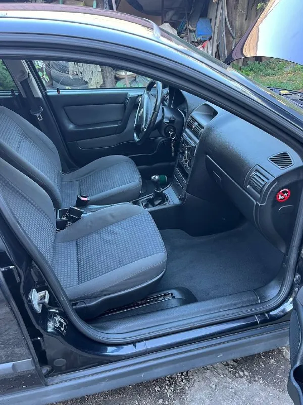 Продается автомобиль opel астра g, 2003 г. в. двигатель 1.6, 16 клапанный, оригинальный пробег 180.000 тыс. км. автомобиль в хорошем состоянии, ничего делать не нужно. новые два комплекта резины. кондиционер заправлен. оцинкованный кузов. цена 420 тыс. руб. номер телефона +79494800153 осмотр г. макеевка 📞 звоните: +7(949)4800153 - фотография - 6