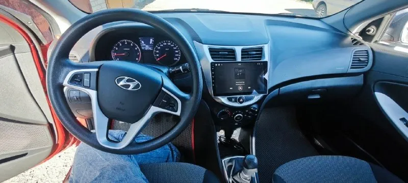 💶 цена: 1200000📮 город: горловка🚘 марка / модель: hyundai accent📅 год выпуска: 2012📊 пробег: 32 554⛽️ двигатель (тип, объем, мощность):1.4 (цепь)✅ vin код: z94ct41cacr138233🔧 тип кпп: механика👨‍⚖️ владельцев в птс: 1 владелец⏳ срок владения: с 2012 года📝 описание: hyundai accent 2012 г. 1.4 объем. цепной двигатель. пробег 32 546 км. машина полностью обслужена и в родной окраске. не одной царапины. резина лето (новое) на титанах. зима на железяках. мультируль, магнитола 10 дюймов. гаражное хранение, идеальное состояние гарантирую!!!собственник. 180 регион с продажей не спешу. возможен торг, торгуюсь у капота. обмен не интересует по запросу кину видео☎️ контактный телефон: +79493363080 📞 звоните: +7(949)3363080 - фотография - 3