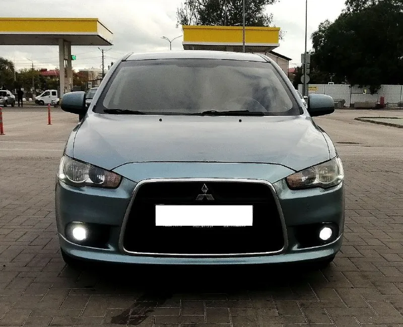 Mitsubishi lancer х 2011 год выпуска, рестайлинг !!! осмотр – донецк, макеевка. тел: +7978-555-77-28 миранда (telegram) цена – 685 000 ₽ по низу рынка, срочная продажа!!! не такси, не каршеринг, во владении у юрлиц никогда не была. стоит на учёте, техосмотр пройден. машина в хорошем рабочем состоянии. все расходники менялись вовремя по регламенту. на момент стоит новый аккумулятор, хорошая зимняя резина, ходовая в полном порядке. есть антикоррозийная обработка, обесшумлена. двигатель заводится без каких-либо проблем, работает ровно, не троит, не дымит. мкпп работает отлично, ошибок на приборной панели нет. отличная комплектация: кондиционер, бортовой компьютер, сенсорная магнитола, abs, esp, иммобилайзер, airbag, подогревы сидений (2 режима), сигнализация starline, подогрев зеркал и заднего стекла, гур, серворуль. торг присутствует, звоните всё обсудим - фотография - 3