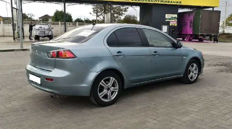 Mitsubishi lancer х 2011 год выпуска, рестайлинг !!! осмотр – донецк, макеевка. тел: +7978-555-77-28 миранда (telegram) цена – 685 000 ₽ по низу рынка, срочная продажа!!! не такси, не каршеринг, во владении у юрлиц никогда не была. стоит на учёте, техосмотр пройден. машина в хорошем рабочем состоянии. все расходники менялись вовремя по регламенту. на момент стоит новый аккумулятор, хорошая зимняя резина, ходовая в полном порядке. есть антикоррозийная обработка, обесшумлена. двигатель заводится без каких-либо проблем, работает ровно, не троит, не дымит. мкпп работает отлично, ошибок на приборной панели нет. отличная комплектация: кондиционер, бортовой компьютер, сенсорная магнитола, abs, esp, иммобилайзер, airbag, подогревы сидений (2 режима), сигнализация starline, подогрев зеркал и заднего стекла, гур, серворуль. торг присутствует, звоните всё обсудим - фотография - 4