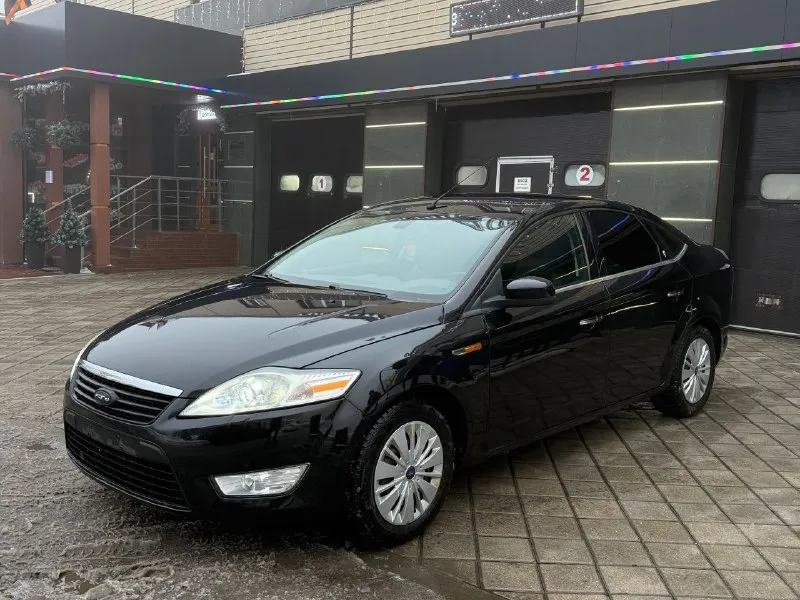 Продам ford mondeo 4 2007 год 2.0л авто в идеальном состоянии двигатель коробка ходовая в отличном самая полная комплектация линзованные фары электропривод сидений датчик дождя/ света климат контроль тесло монитор круиз контроль кнопка старт стоп и многое другое два комплекта колес лето на литых дисках машина на мне на учёте собственник! карта техосмотра имеется!!! цена 670тыс руб срочно‼ торг +79490738124 харцызск - фотография - 3