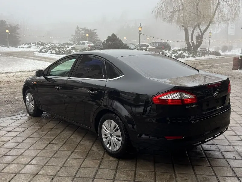 Продам ford mondeo 4 2007 год 2.0л авто в идеальном состоянии двигатель коробка ходовая в отличном самая полная комплектация линзованные фары электропривод сидений датчик дождя/ света климат контроль тесло монитор круиз контроль кнопка старт стоп и многое другое два комплекта колес лето на литых дисках машина на мне на учёте собственник! карта техосмотра имеется!!! цена 670тыс руб срочно‼ торг +79490738124 харцызск - фотография - 4