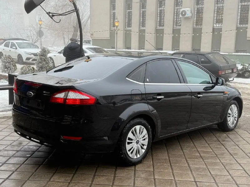 Продам ford mondeo 4 2007 год 2.0л авто в идеальном состоянии двигатель коробка ходовая в отличном самая полная комплектация линзованные фары электропривод сидений датчик дождя/ света климат контроль тесло монитор круиз контроль кнопка старт стоп и многое другое два комплекта колес лето на литых дисках машина на мне на учёте собственник! карта техосмотра имеется!!! цена 670тыс руб срочно‼ торг +79490738124 харцызск - фотография - 7
