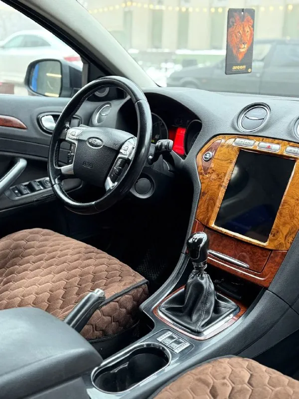 Продам ford mondeo 4 2007 год 2.0л авто в идеальном состоянии двигатель коробка ходовая в отличном самая полная комплектация линзованные фары электропривод сидений датчик дождя/ света климат контроль тесло монитор круиз контроль кнопка старт стоп и многое другое два комплекта колес лето на литых дисках машина на мне на учёте собственник! карта техосмотра имеется!!! цена 670тыс руб срочно‼ торг +79490738124 харцызск - фотография - 8