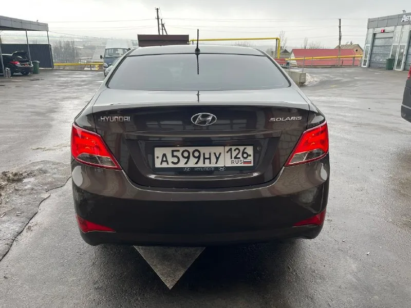 Продам hyundai solaris рестайлинг. 2014г. в. 1.6 на акпп 6-ст. 151000км. пробега. авто в отличном состоянии, по всем параметрам. двигатель работает ровно, масло не подъедает, работает тихо. акпп так же без проблем, без пинков и дефектов. по кузову так же все отлично, без гнили и ржавчины, авто южное. по ходовой тишина. резина зима новая nokian. вложений не требует. осмотр старобешево цена 885 000₽ подробности по тф. +79493370737 +79493185079 - фотография - 7