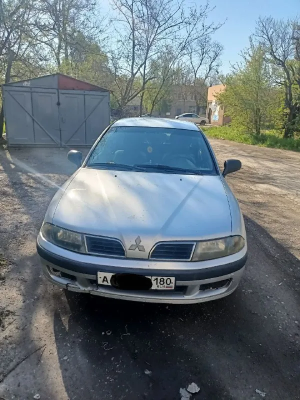 Продам mitsubishi carisma, 2003 год, бензин, коробка автомат, двигатель 1,6 пробег 334000 авто полностью на ходу. цена 280 000 руб. находится в мариуполе все вопросы и подробности по телефону: +79497274608 владимир 📲 tg: владимир морозов 📞 звоните: +7(949)7274608 - фотография - 2
