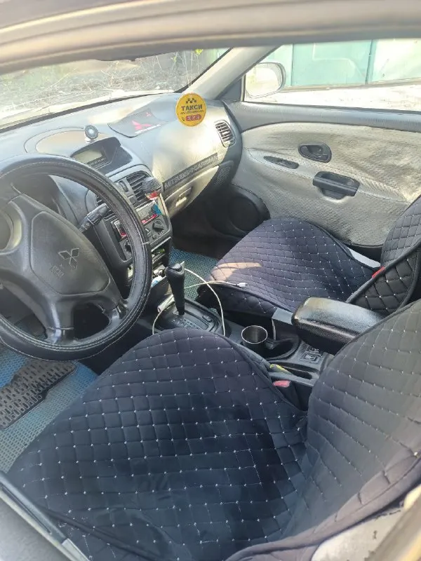 Продам mitsubishi carisma, 2003 год, бензин, коробка автомат, двигатель 1,6 пробег 334000 авто полностью на ходу. цена 280 000 руб. находится в мариуполе все вопросы и подробности по телефону: +79497274608 владимир 📲 tg: владимир морозов 📞 звоните: +7(949)7274608 - фотография - 5