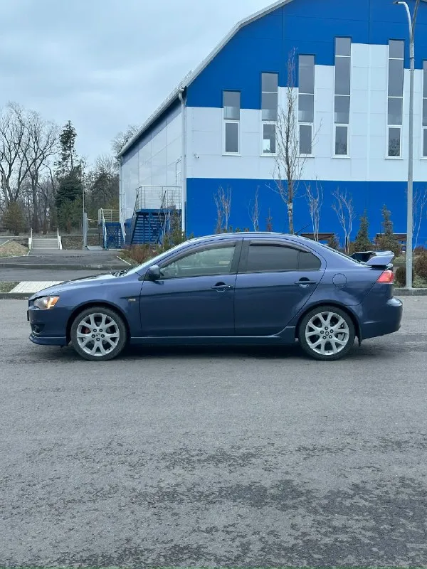 Продам: mitsubishi lancer x топливо: бензин / газ год выпуска: 2007 (японская сборка) тип кпп: автомат (не вариатор - как у 1.8л - 2.0л❗) ✅ пробег : 250.000 км - автомобиль в хорошем состоянии, надежный, экономичный, недорогой в обслуживании. гаражное хранение. масло, фильтра, свечи, антифриз, диски, колодки - заменены. ✅ кузов: варить и красить - не нужно. - двигатель 1.5л : цепной, работает отлично, масло не расходует❗ ✅ комплектация: - кондиционер (работает) - подогрев сидений. - сигнализация (star-line с автозапуском) - дорогая музыка. - мультимедиа: навигация, камера зад. вида, bluetooth, usb. - 2 комплекта ключей - 2 комплекта колес ✅ документы: - я собственник, продажа только с переоформлением в мрео❗ 📍осмотр в г. донецк, калининский р-н. цена: 749.999 руб - обмен не интересует, торг возможен у автомобиля. звоните: +7 (949) 086-28-34 📞 звоните: +7(949)0862834 - фотография - 4