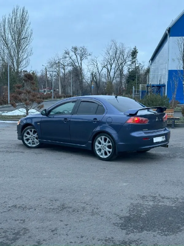 Продам: mitsubishi lancer x топливо: бензин / газ год выпуска: 2007 (японская сборка) тип кпп: автомат (не вариатор - как у 1.8л - 2.0л❗) ✅ пробег : 250.000 км - автомобиль в хорошем состоянии, надежный, экономичный, недорогой в обслуживании. гаражное хранение. масло, фильтра, свечи, антифриз, диски, колодки - заменены. ✅ кузов: варить и красить - не нужно. - двигатель 1.5л : цепной, работает отлично, масло не расходует❗ ✅ комплектация: - кондиционер (работает) - подогрев сидений. - сигнализация (star-line с автозапуском) - дорогая музыка. - мультимедиа: навигация, камера зад. вида, bluetooth, usb. - 2 комплекта ключей - 2 комплекта колес ✅ документы: - я собственник, продажа только с переоформлением в мрео❗ 📍осмотр в г. донецк, калининский р-н. цена: 749.999 руб - обмен не интересует, торг возможен у автомобиля. звоните: +7 (949) 086-28-34 📞 звоните: +7(949)0862834 - фотография - 5