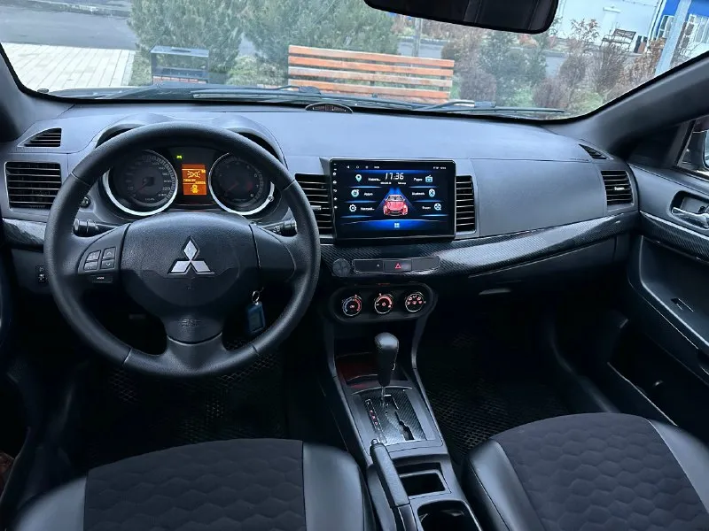 Продам: mitsubishi lancer x топливо: бензин / газ год выпуска: 2007 (японская сборка) тип кпп: автомат (не вариатор - как у 1.8л - 2.0л❗) ✅ пробег : 250.000 км - автомобиль в хорошем состоянии, надежный, экономичный, недорогой в обслуживании. гаражное хранение. масло, фильтра, свечи, антифриз, диски, колодки - заменены. ✅ кузов: варить и красить - не нужно. - двигатель 1.5л : цепной, работает отлично, масло не расходует❗ ✅ комплектация: - кондиционер (работает) - подогрев сидений. - сигнализация (star-line с автозапуском) - дорогая музыка. - мультимедиа: навигация, камера зад. вида, bluetooth, usb. - 2 комплекта ключей - 2 комплекта колес ✅ документы: - я собственник, продажа только с переоформлением в мрео❗ 📍осмотр в г. донецк, калининский р-н. цена: 749.999 руб - обмен не интересует, торг возможен у автомобиля. звоните: +7 (949) 086-28-34 📞 звоните: +7(949)0862834 - фотография - 6