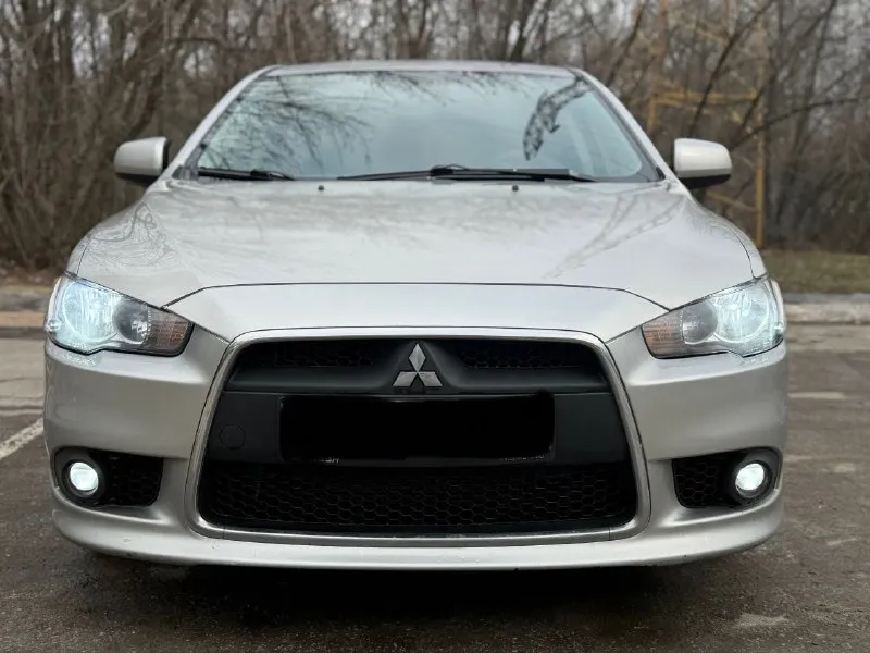 Mitsubishi lancer x 2012 год мотор 1.6 коробка автомат. родной пробег 135 тыс км. автомобиль в хорошем состоянии. мотор работает отлично. акпп также в штатном режиме. все стекла родные. комплектация: 4 эсп, кондиционер, мультируль, установлена магнитола с камерой заднего вида, сигнализация, подогревы передних сидений. из последнего меняли: амортизаторы( перед, зад), термостат, масло в акпп. документы в порядке. полное переоформление. цена: 950 тыс +79495064409 - фотография - 2