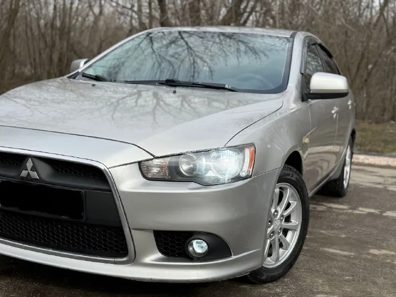Mitsubishi lancer x 2012 год мотор 1.6 коробка автомат. родной пробег 135 тыс км. автомобиль в хорошем состоянии. мотор работает отлично. акпп также в штатном режиме. все стекла родные. комплектация: 4 эсп, кондиционер, мультируль, установлена магнитола с камерой заднего вида, сигнализация, подогревы передних сидений. из последнего меняли: амортизаторы( перед, зад), термостат, масло в акпп. документы в порядке. полное переоформление. цена: 950 тыс +79495064409 - фотография - 4