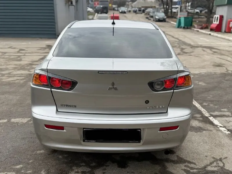 Mitsubishi lancer x 2012 год мотор 1.6 коробка автомат. родной пробег 135 тыс км. автомобиль в хорошем состоянии. мотор работает отлично. акпп также в штатном режиме. все стекла родные. комплектация: 4 эсп, кондиционер, мультируль, установлена магнитола с камерой заднего вида, сигнализация, подогревы передних сидений. из последнего меняли: амортизаторы( перед, зад), термостат, масло в акпп. документы в порядке. полное переоформление. цена: 950 тыс +79495064409 - фотография - 8