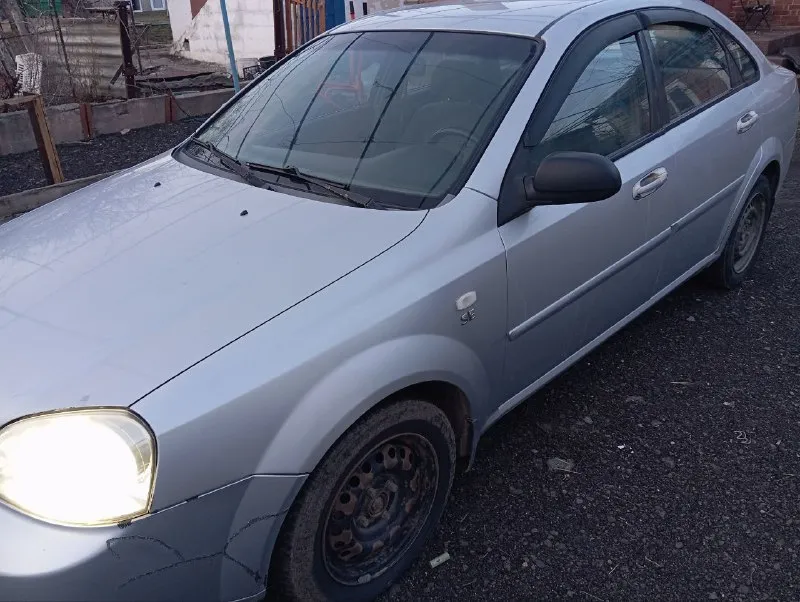 Продам. chevrolet лачетти. 2007 г. в. 1,6 газ бензин. пробег 355000. машина в хорошем состоянии обсл... - фотография