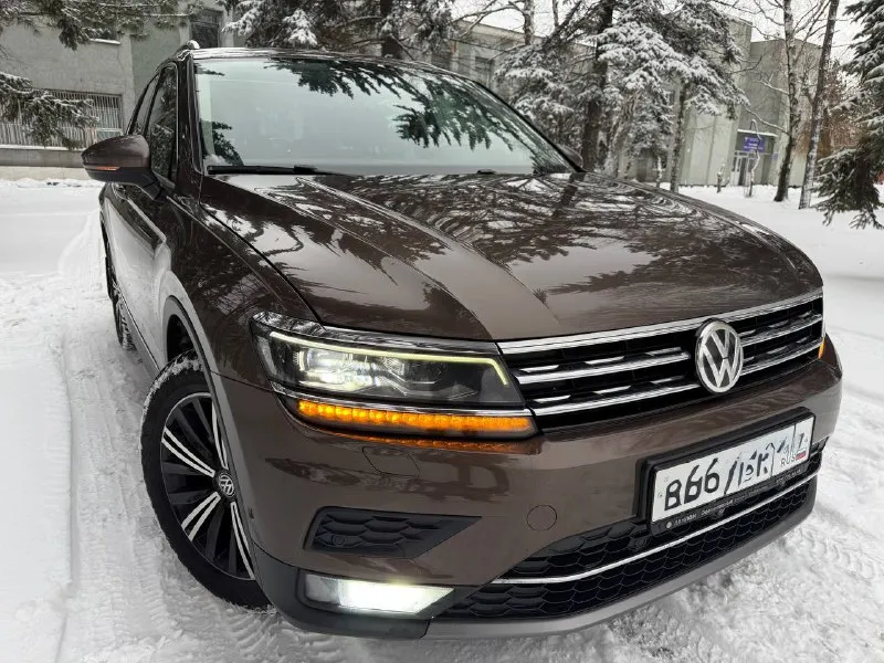 Volkswagen tiguan 2018г в самой жирной комплектации (алькантара, панорама, камеры 360, массаж сидения, 3х зонный климат, слепые зоны, все ассистенты, автопарковка) полный привод 2.0 turbo + 7dsg dq-500 мощность: 180л. с пробег: 167т. км (родной) официальный дилерский автомобиль, не грузия. кузов в отличном состоянии! без дефектов. все стекла родные. ухоженный салон. новые зимние шины nokian r18 (made in korea) комплектация 🔥 : ✅старт/стоп ✅бесключевой доступ ✅цифровая приборка с навигацией и ассистентами (максимальная) ✅слепые зоны ✅камеры 360 ✅адаптивный круиз ✅электропривод багажника ✅адаптивные фары mid led (full led поворотные+подсветка поворотов) ✅авто дальний свет ✅парктроники в круг 360 ✅панорамная крыша с ambient light ✅беспроводная зарядка ✅подсветка ambient light всего салона ✅датчики давления шин ✅дистроник ✅контроль дистанции спереди и сзади ✅два ключа 📞 звоните: +7(949)3568852 - фотография - 5