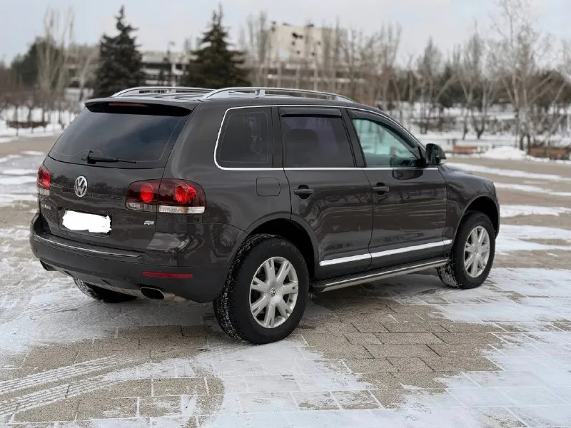 🚙марка: volkswagen touareg ⚙️двигатель: 3.6 ⛽️вид топлива: бензин 📅год выпуска: 2008 💴цена: 1170.000руб торг 🗺️пробег:250.000км 📦:кпп :автомат в продаже volkswagen touareg в отличном состоянии весь в заводском окрасе все стекла родные автомобиль обслужены прошел полное то мотор без ли либо каких нареканий автомат также в отличном состоянии вложения автомобиль абсолютно не требует автомобиль чистый готов к любому переоформлению комплектация круизконтроль двухзонный климат контроль подогрев сидений задних передних обогрев руля электрорегулировка сидений электрозеркала датчик дождя датчик света обогрев заднего стекла переднего обогрев зеркал боковых мультируль все остальные доп вопросы 📞 на этом номер есть +7 (949) 753-36-84 есть telegram 📍•город мариуполь 📞 звоните: +7(949)7533684 - фотография - 4