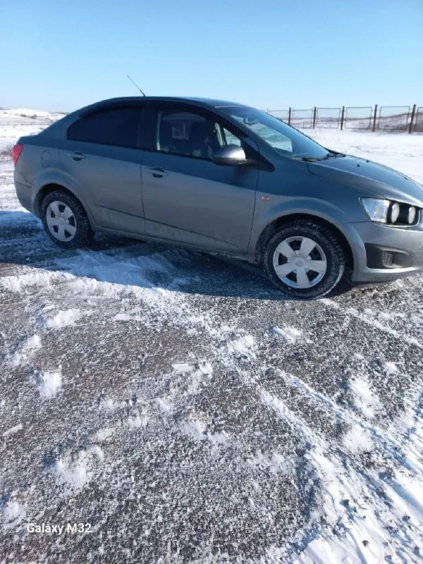 Chevrolet aveo т300 2013 года, мотор 1.6, коробка механика, передний привод, пробег 115 000 км, авто... - фотография