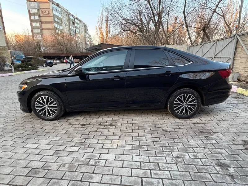 Продам volkswagen jetta 7 (2021) 1 720 000 ₽ 1.4t мотор, 147 л. с. 8 ст aisin пробег: 106 000 км. комлпектация: кондиционер, датчик слепых зон, предотвращение столкновения, датчик света, двухцветный кожаный салон, камера заднего вида, подогрев зеркал, круиз контроль. мультимедия: carplay, androidauto, bluetooth. звоните в любое удобное для вас время. осмотр г. донецк +7 949 441 39 85 - фотография - 7