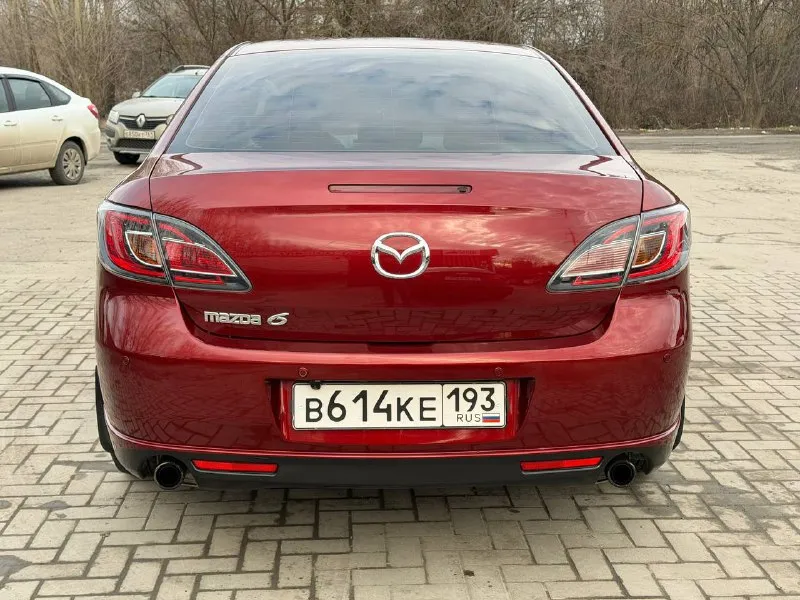 Мазда 6 2008 г. 2 литра 147 л/с автомат автомобиль в отличном состоянии для своего возраста, без гнили и рыжиков, машина южная, мотор работает ровно, не троит, автомат переключает отлично, подвеска без посторонних стуков, кондей работает, парктроник перед и зад, камера заднего вида, сигнализация с автозапуском, мульти руль, круиз контроль, резина свежая липучка, почти в заводском окрасе, несколько крашеных элементов, мелки сколы, царапины имеются в силу возраста! цена 850 торг не большой! машина на данный момент в ростове, пригоню в днр по договоренности! +79286261224 - фотография - 5