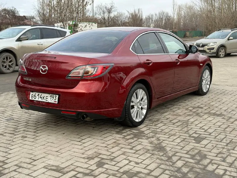 Мазда 6 2008 г. 2 литра 147 л/с автомат автомобиль в отличном состоянии для своего возраста, без гнили и рыжиков, машина южная, мотор работает ровно, не троит, автомат переключает отлично, подвеска без посторонних стуков, кондей работает, парктроник перед и зад, камера заднего вида, сигнализация с автозапуском, мульти руль, круиз контроль, резина свежая липучка, почти в заводском окрасе, несколько крашеных элементов, мелки сколы, царапины имеются в силу возраста! цена 850 торг не большой! машина на данный момент в ростове, пригоню в днр по договоренности! +79286261224 - фотография - 7