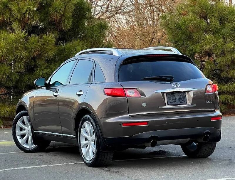 В продаже в идеальном состоянии infinity fx35, инфинити, вложений не каких не требует ! в дтп не когда не участвовал 100% обслужен абсолютно весь ! кузов без корозии и каких либо дефектов ! двигатель работает идеально! коробка автомат, работает идеально ! пробег 152 км. ! жирная комплектация, кожаный салон, эл. сиденья, память сидений, эл. регулирования руля, поставили tesla монитор google, качественный, камера заднего вида, люк, регулирование поясницы, доработанные фары сделано очень качественно, и многое другое вложено очень много сил времени и денег ! любое переформление, я хозяин, возможен обмен, на авто дешевле, цена : 925 руб. реальному покупателю реальный торг ! +79494549599 также есть телеграмм, и max 📞 звоните: +7(949)4549599 - фотография - 5
