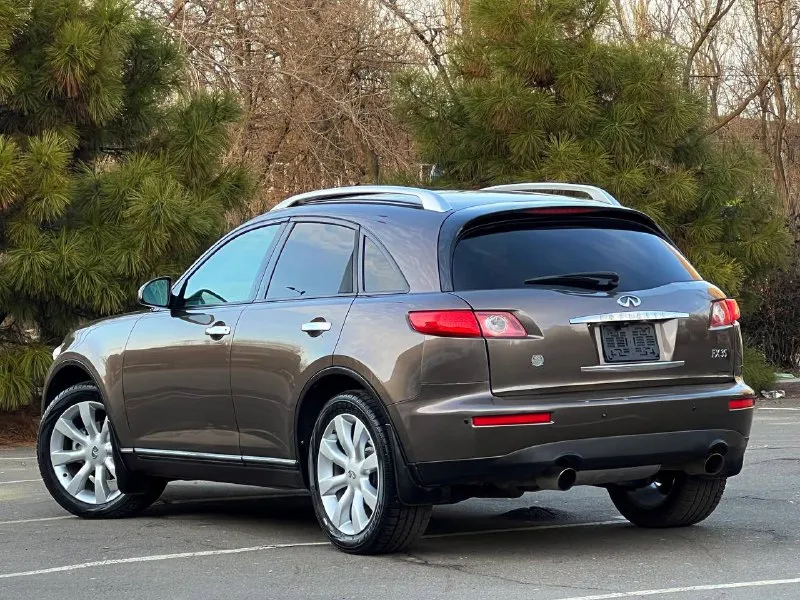 В продаже в идеальном состоянии infinity fx35, инфинити, вложений не каких не требует ! в дтп не когда не участвовал 100% обслужен абсолютно весь ! кузов без корозии и каких либо дефектов ! двигатель работает идеально! коробка автомат, работает идеально ! пробег 152 км. ! жирная комплектация, кожаный салон, эл. сиденья, память сидений, эл. регулирования руля, поставили tesla монитор google, качественный, камера заднего вида, люк, регулирование поясницы, доработанные фары сделано очень качественно, и многое другое вложено очень много сил времени и денег ! любое переформление, я хозяин, возможен обмен, на авто дешевле, цена : 925 руб. реальному покупателю реальный торг ! +79494549599 также есть телеграмм, и max 📞 звоните: +7(949)4549599 - фотография - 6