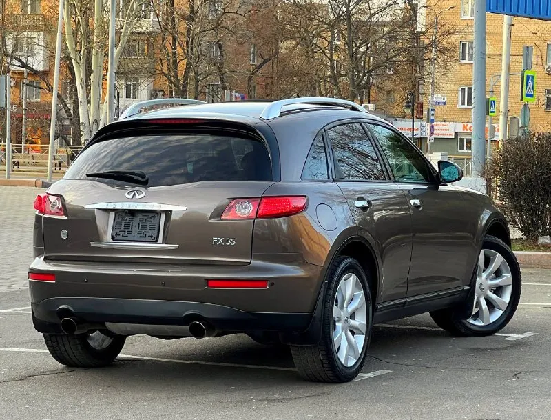 В продаже в идеальном состоянии infinity fx35, инфинити, вложений не каких не требует ! в дтп не когда не участвовал 100% обслужен абсолютно весь ! кузов без корозии и каких либо дефектов ! двигатель работает идеально! коробка автомат, работает идеально ! пробег 152 км. ! жирная комплектация, кожаный салон, эл. сиденья, память сидений, эл. регулирования руля, поставили tesla монитор google, качественный, камера заднего вида, люк, регулирование поясницы, доработанные фары сделано очень качественно, и многое другое вложено очень много сил времени и денег ! любое переформление, я хозяин, возможен обмен, на авто дешевле, цена : 925 руб. реальному покупателю реальный торг ! +79494549599 также есть телеграмм, и max 📞 звоните: +7(949)4549599 - фотография - 7