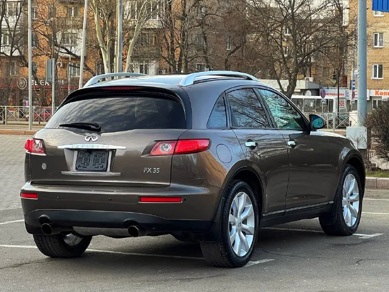 В продаже в идеальном состоянии infinity fx35, инфинити, вложений не каких не требует ! в дтп не когда не участвовал 100% обслужен абсолютно весь ! кузов без корозии и каких либо дефектов ! двигатель работает идеально! коробка автомат, работает идеально ! пробег 152 км. ! жирная комплектация, кожаный салон, эл. сиденья, память сидений, эл. регулирования руля, поставили tesla монитор google, качественный, камера заднего вида, люк, регулирование поясницы, доработанные фары сделано очень качественно, и многое другое вложено очень много сил времени и денег ! любое переформление, я хозяин, возможен обмен, на авто дешевле, цена : 925 руб. реальному покупателю реальный торг ! +79494549599 также есть телеграмм, и max 📞 звоните: +7(949)4549599 - фотография - 8