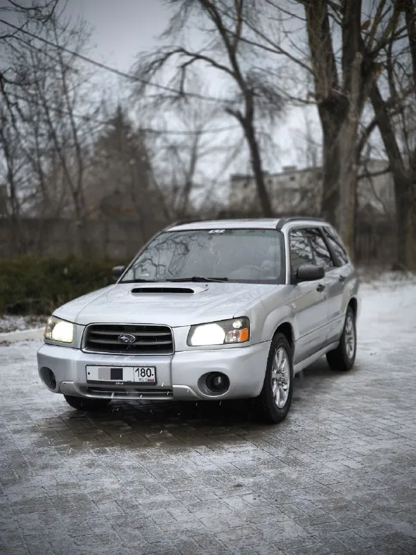Продам subaru forester sg 💵цена : 690.000 ₽ торг 📍город - макеевка год - 2005 двигатель бензин - 2.0xt турбо (220 л. с) руль - левый коробка - автомат привод - полный двигатель, коробка, ходовка в хорошем состоянии, кожаный салон, хороший свет, хорошая музыка с андроид магнитолой, приятный выхлоп, практически новая зимняя резина на шипах. есть моменты по кузову, на фото видно. ( дно, пороги, стаканы, всё хорошем состоянии) машина на ходу каждый день, документы в порядке. звоните, пишите, расскажу по машине, дополнительные фото, видео скину в лс. +79493887082 📲 tg: @abonahl 📞 звоните: +7(949)3887082 - фотография - 2