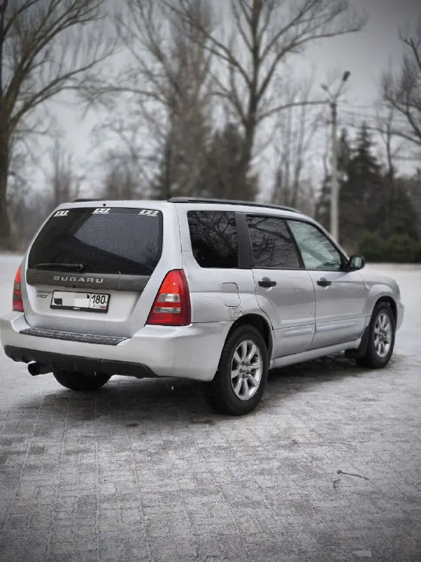 Продам subaru forester sg 💵цена : 690.000 ₽ торг 📍город - макеевка год - 2005 двигатель бензин - 2.0xt турбо (220 л. с) руль - левый коробка - автомат привод - полный двигатель, коробка, ходовка в хорошем состоянии, кожаный салон, хороший свет, хорошая музыка с андроид магнитолой, приятный выхлоп, практически новая зимняя резина на шипах. есть моменты по кузову, на фото видно. ( дно, пороги, стаканы, всё хорошем состоянии) машина на ходу каждый день, документы в порядке. звоните, пишите, расскажу по машине, дополнительные фото, видео скину в лс. +79493887082 📲 tg: @abonahl 📞 звоните: +7(949)3887082 - фотография - 3